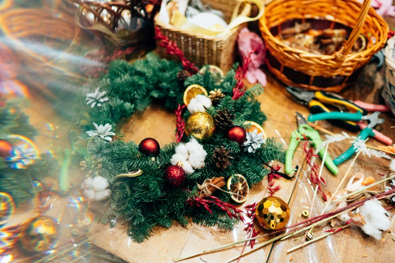 an assortment of small christmas ornaments on a table