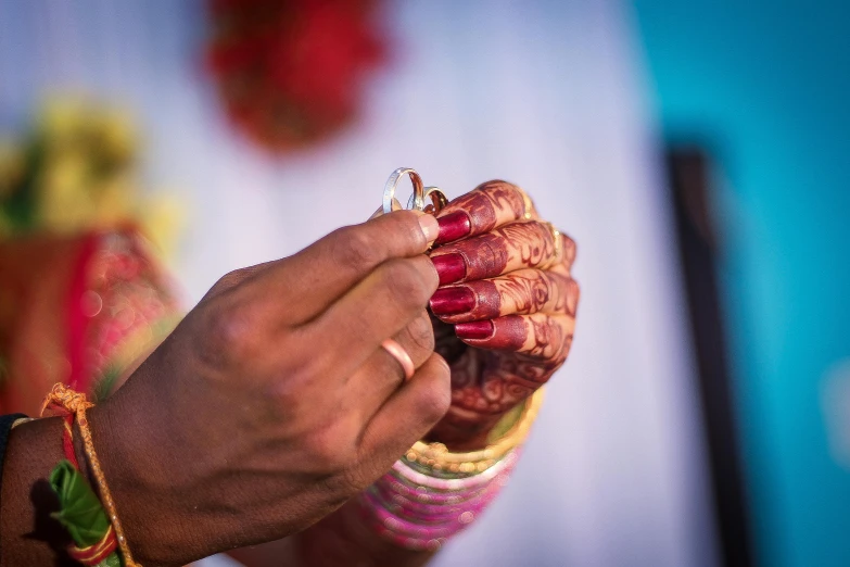 the hand of a person is holding some sort of item