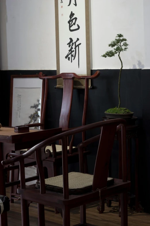 a room filled with a wooden table and chairs