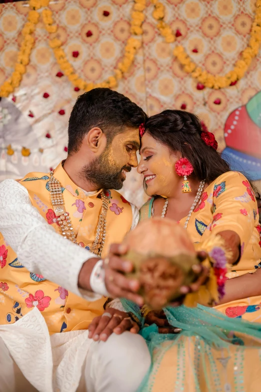 a man holding the brides hand at their wedding