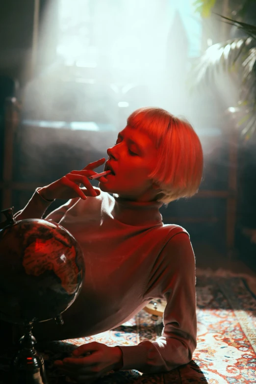 a red - haired woman is smoking on a pipe
