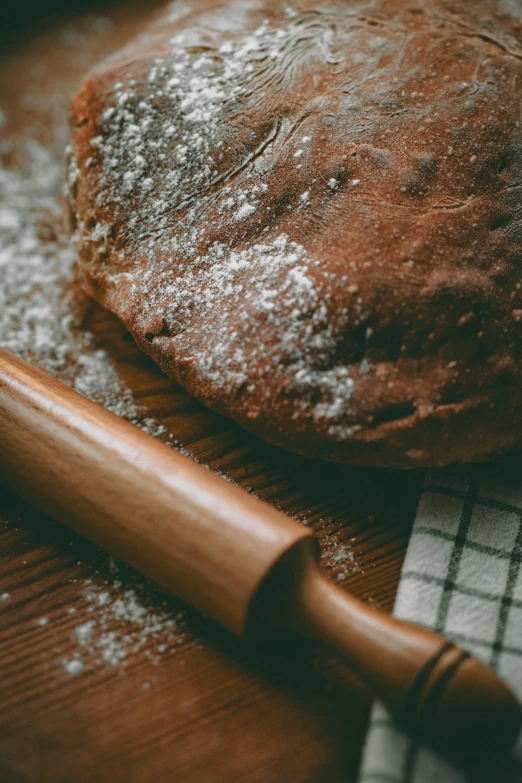 an uncooked loaf of bread on top of a counter