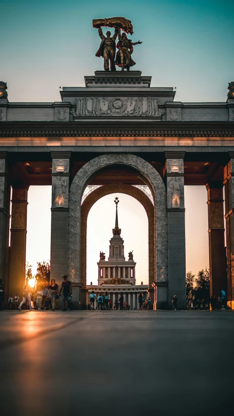 the view from inside the arch of an ornate building