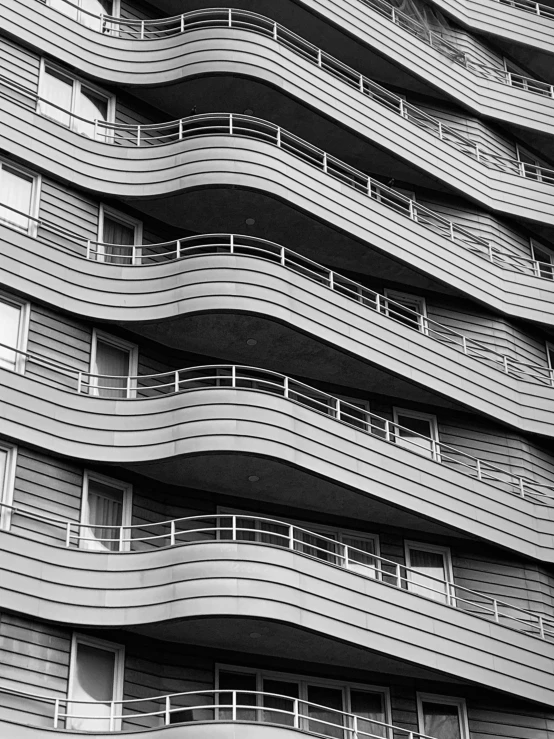 a tall building that has balconies and balconies in it