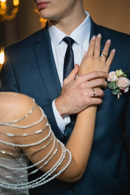 a bride and groom posing for their wedding po