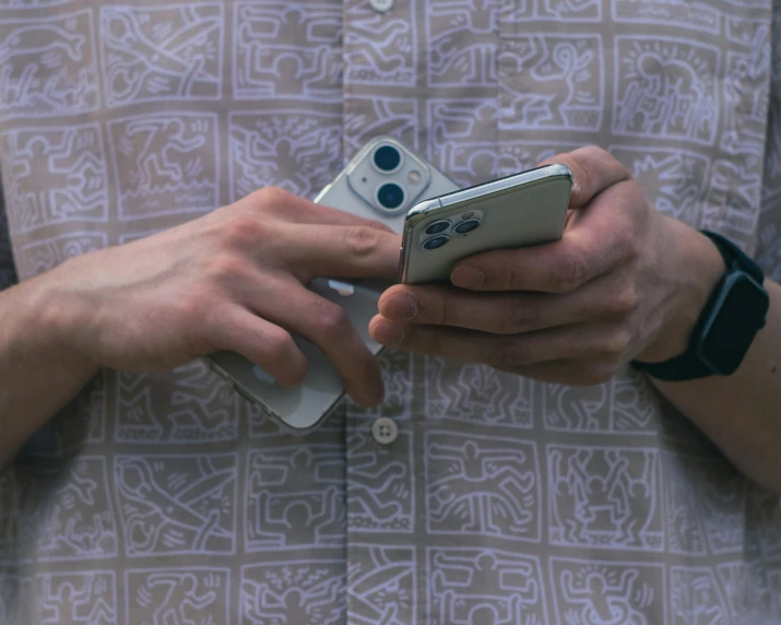 man with two dice ons in his hands