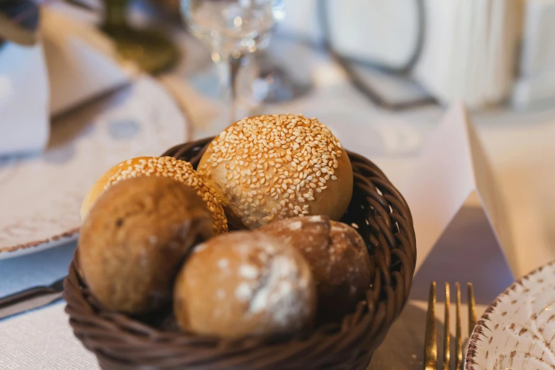 a basket filled with donuts on top of a table