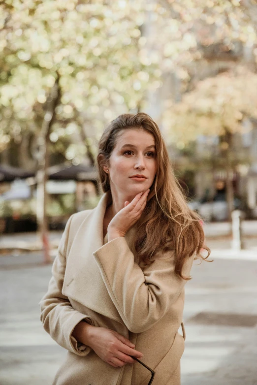 a beautiful young woman posing for a po