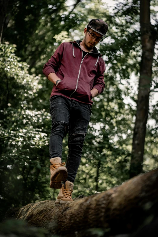 a man riding a skateboard on top of a tree