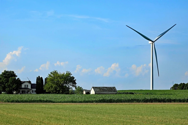 a wind farm on the side of the road