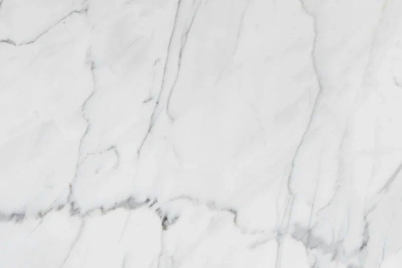a white marble textured surface of marble or stone