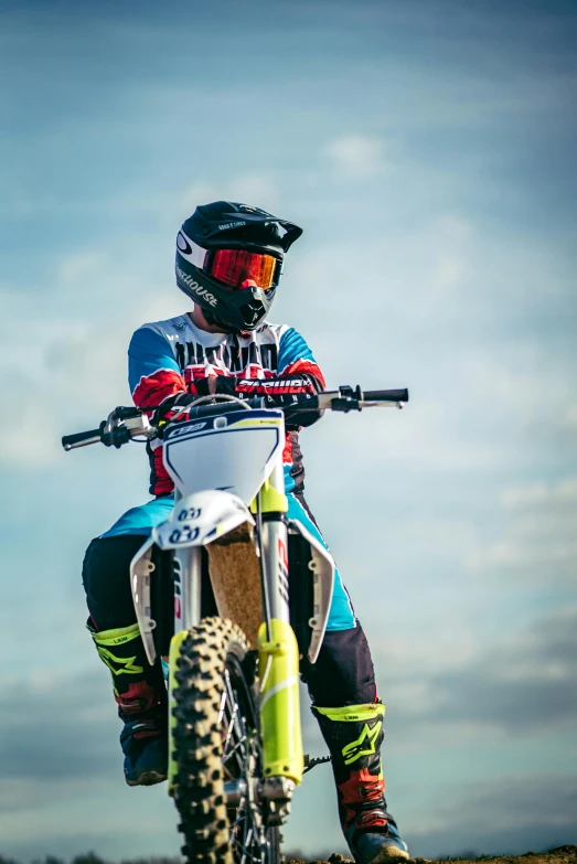 a person riding on the back of a dirt bike