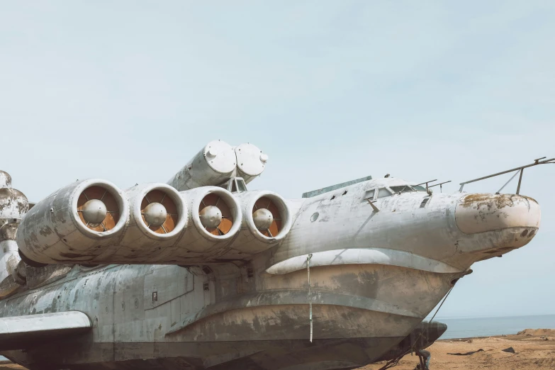 an airplane that has been abandoned on the beach