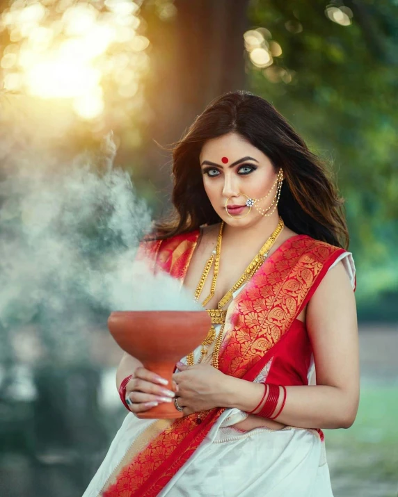 an attractive woman with a necklace and headpiece smoking smoke