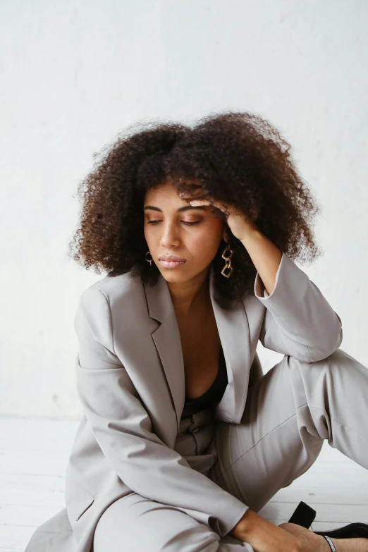 an african american woman dressed in business attire