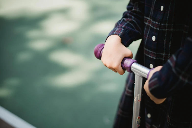 a person standing on a boat holding soing in their hand