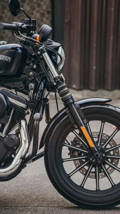 a motorcycle that is parked on a street