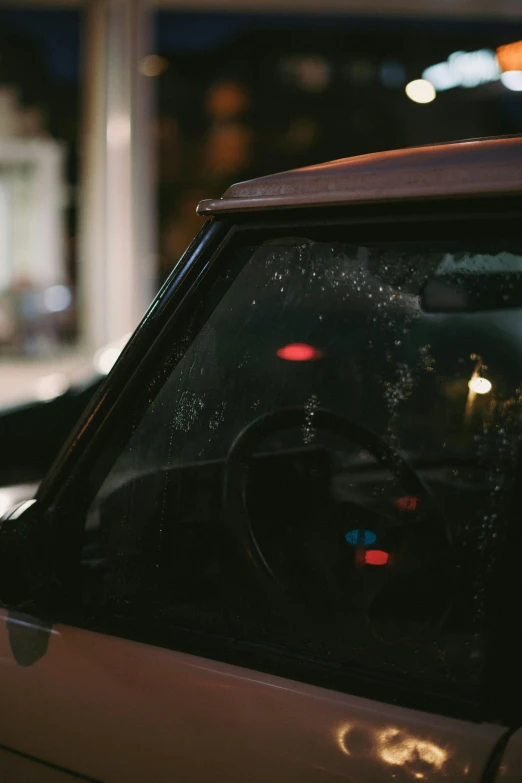 this is the view of a car's dashboard at night