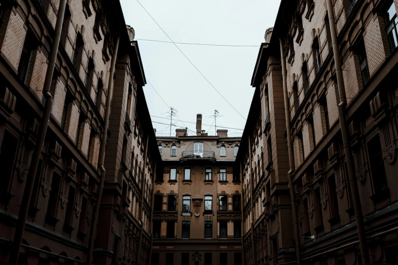 there is some lightening above an alley way