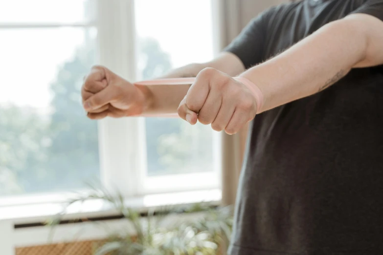 a person standing with one arm stretched out