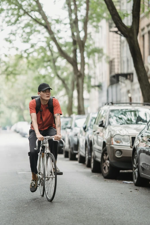 a man is riding his bike in the street