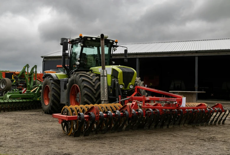 an image of a tractor parked in the dirt