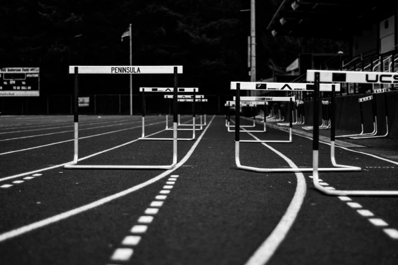 the starting of a race at night with lights and signs