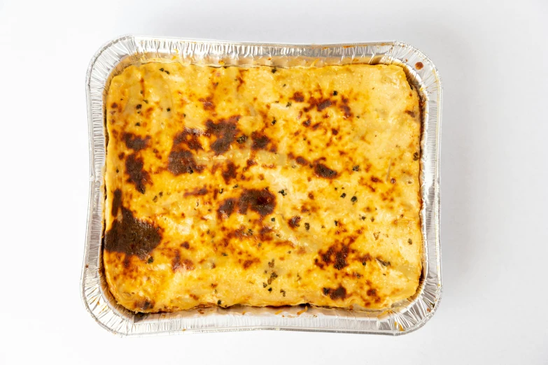 a dish in a baking pan with soing in it