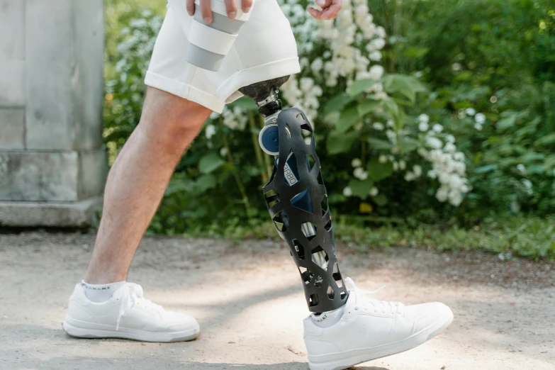 a close up view of a person walking with a skateboard