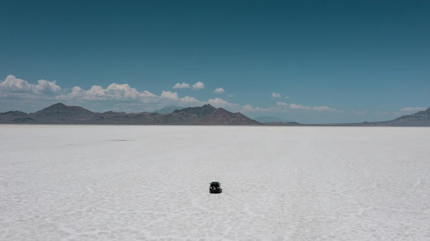 there is a single black object on the beach