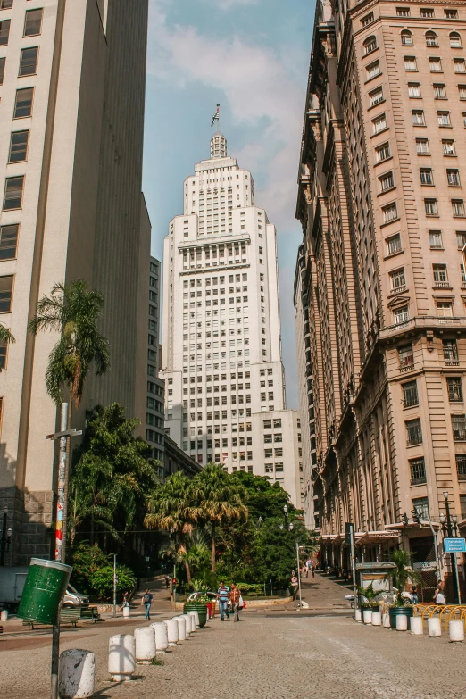 there are several buildings and some trees in the city