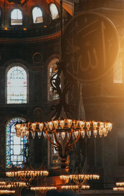 an elaborately decorated chandelier hanging in a room