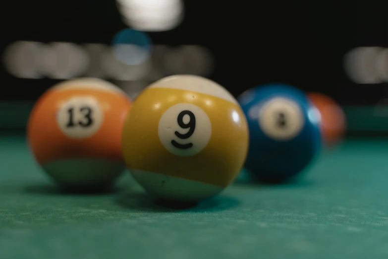 some pool balls sitting on a table