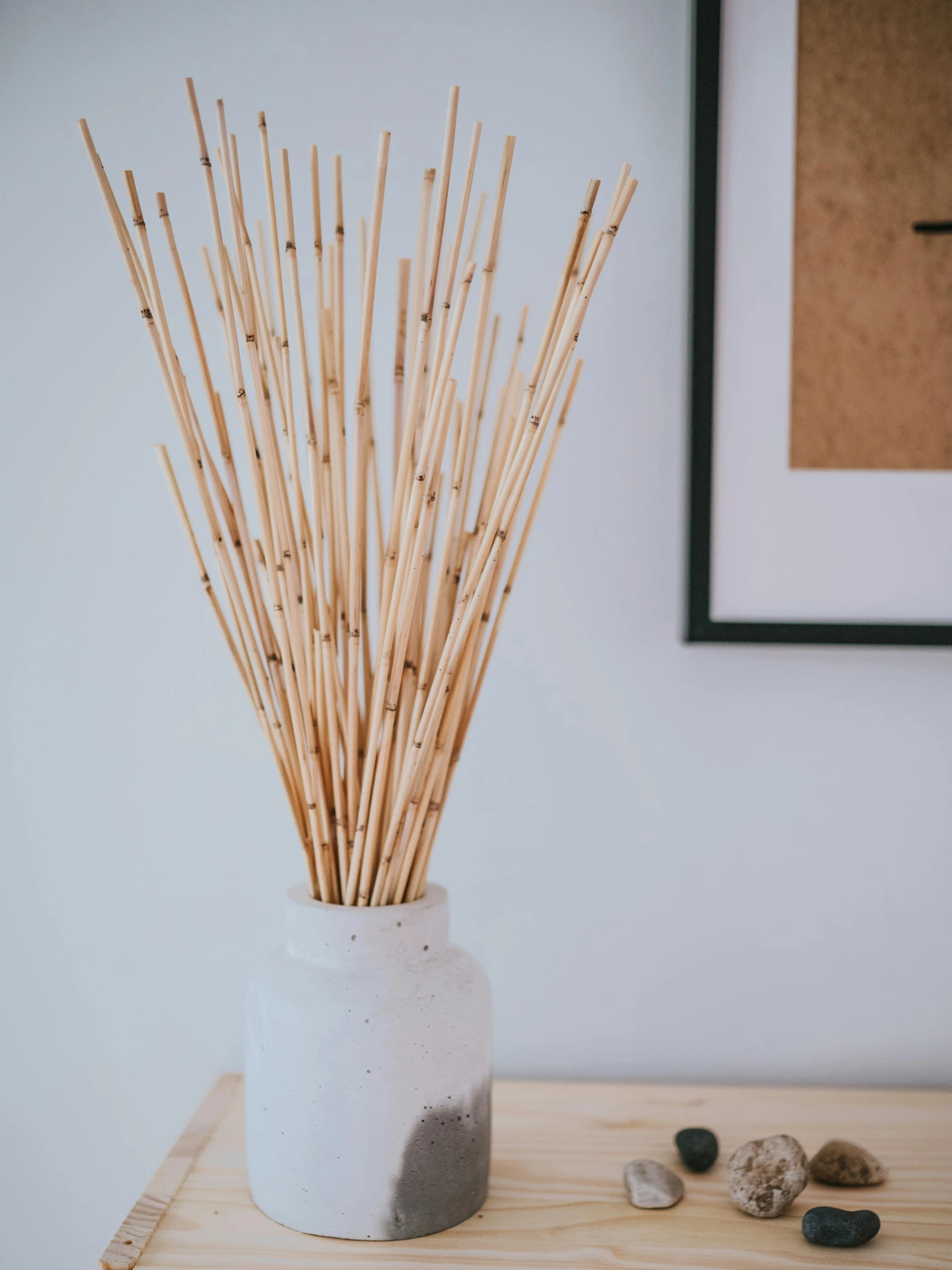 a wooden plant sitting on top of a wooden table