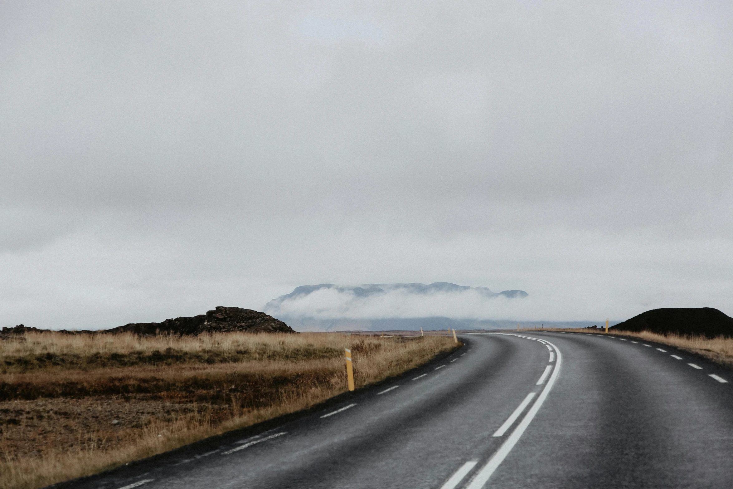 a long and empty road in the middle of nowhere