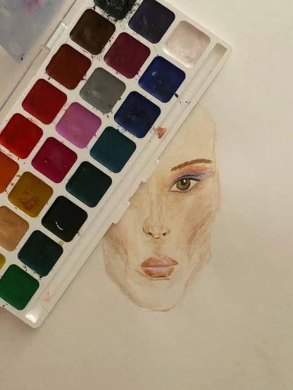 an artistic painting with a watercolor face