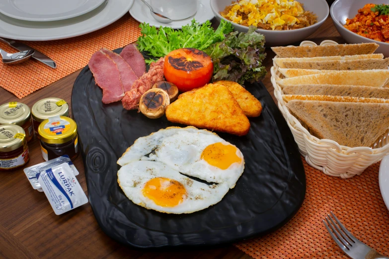 the food is on a tray beside a bowl of other foods