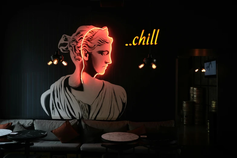 neon art on the wall of a woman's head