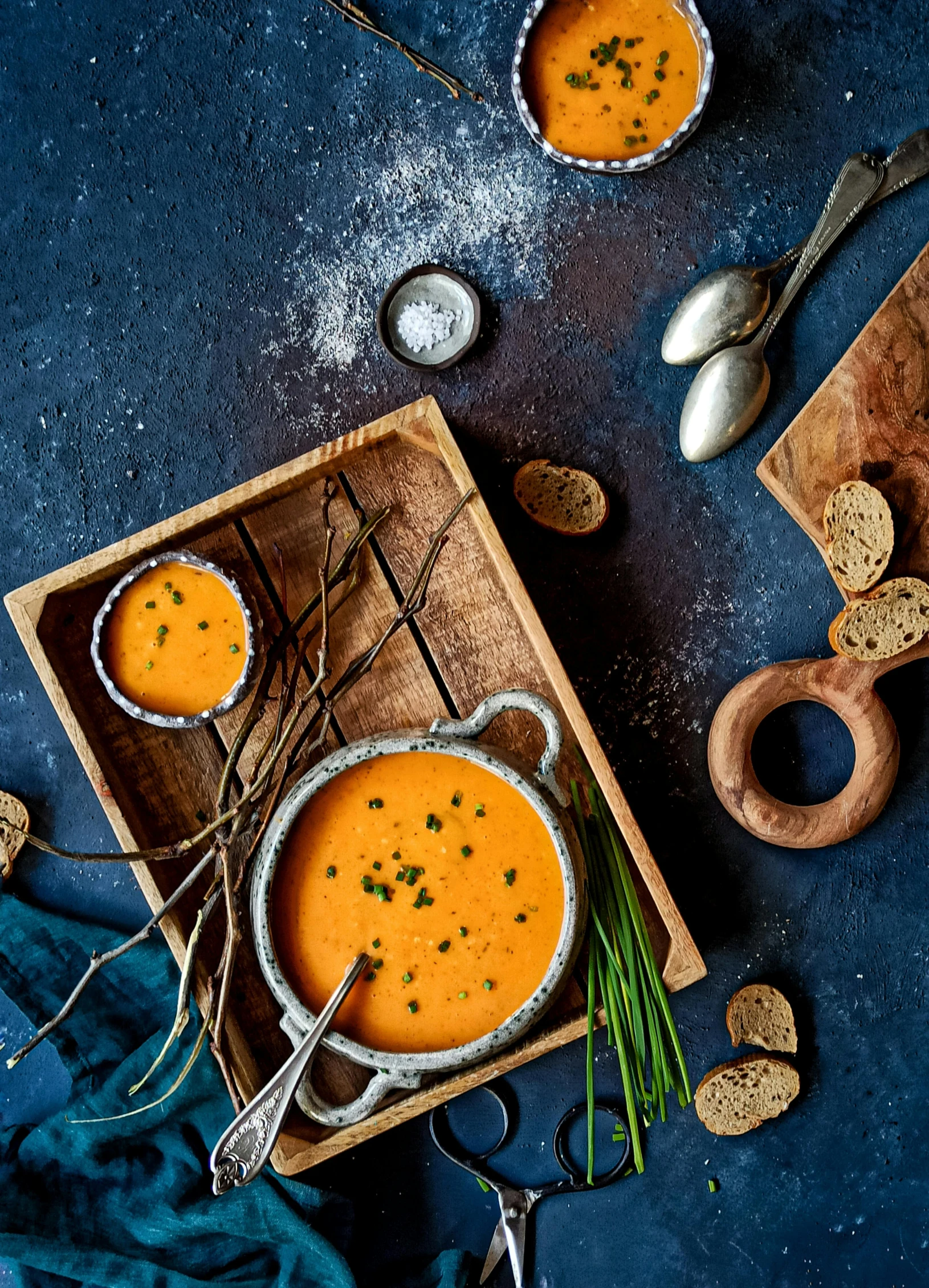 two bowls filled with soup on top of a table