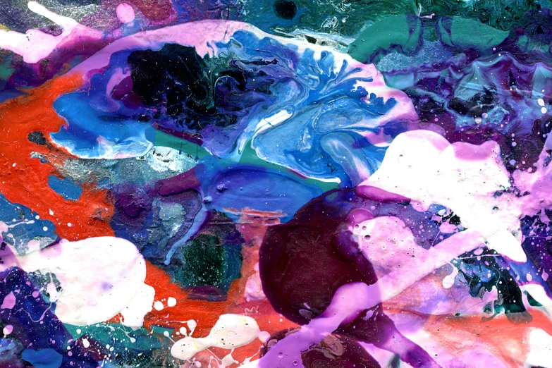 an abstract painting of purple, green and blue paint