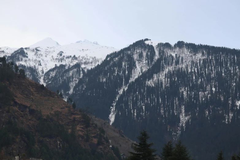 the mountain slopes are covered with snow
