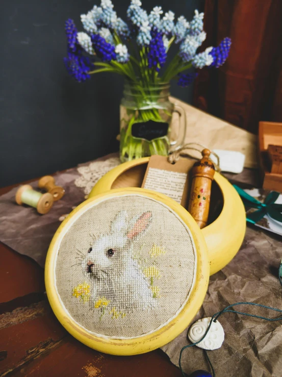 an animal themed picture painted on a yellow table