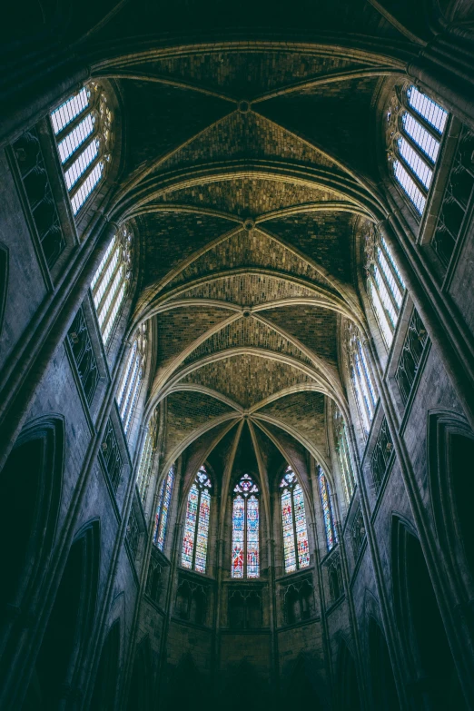 a cathedral with multiple stained glass windows in it