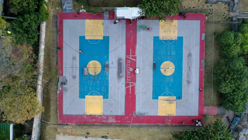 an aerial view shows the top of a sports court in an aerial view of an apartment building