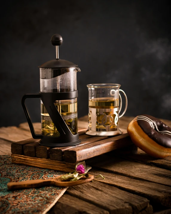 some kind of steamy cup and some tea on a table