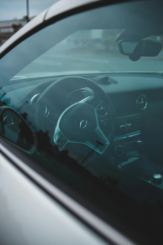 a close up of a dashboard and interior of a car