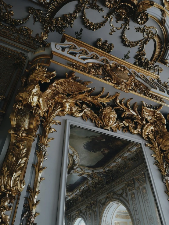 a large mirror that is inside of a wall