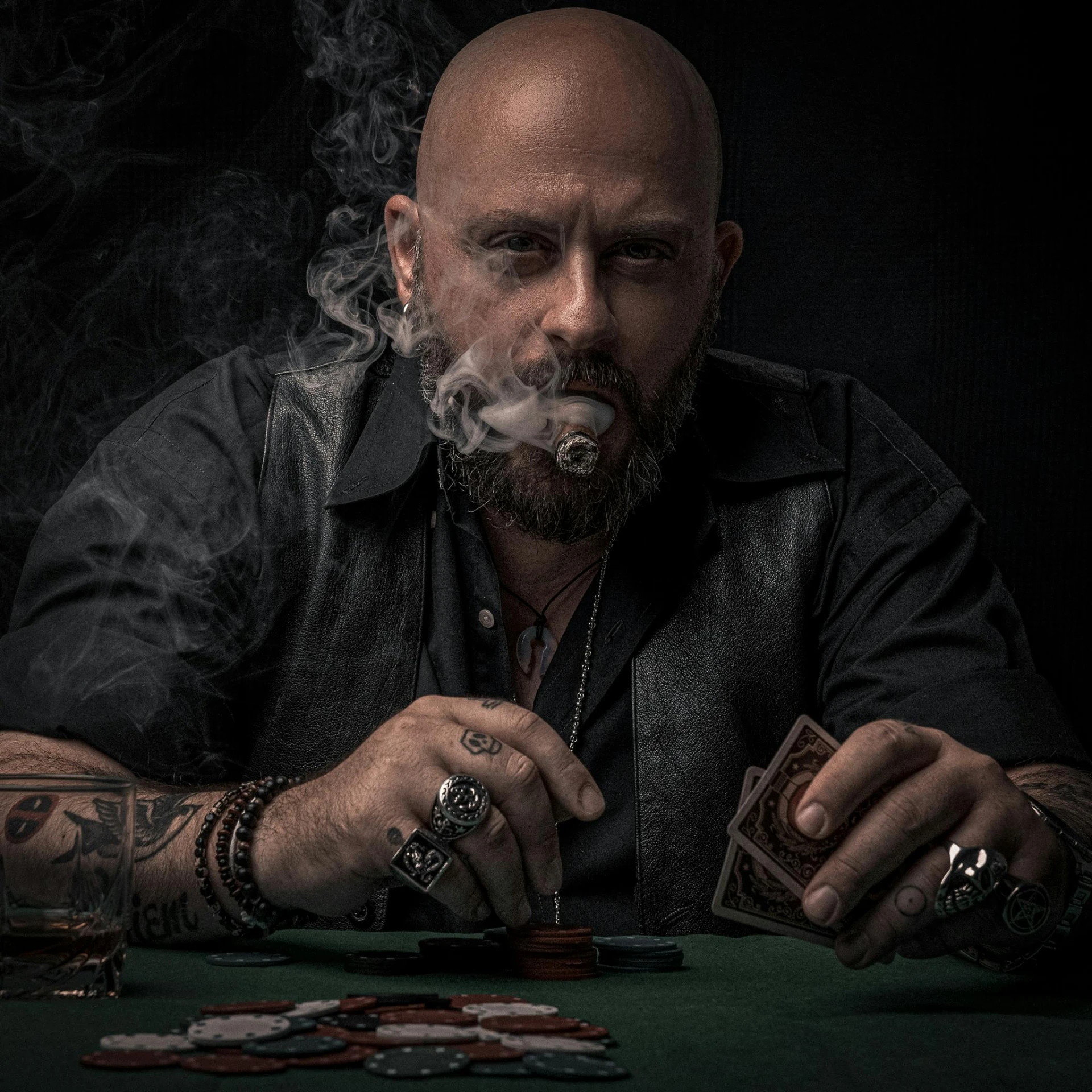 the man is smoking cigar with smoke coming out of his face