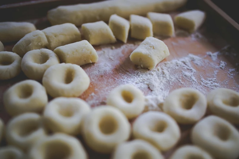 some dough rolls and small pieces of bread