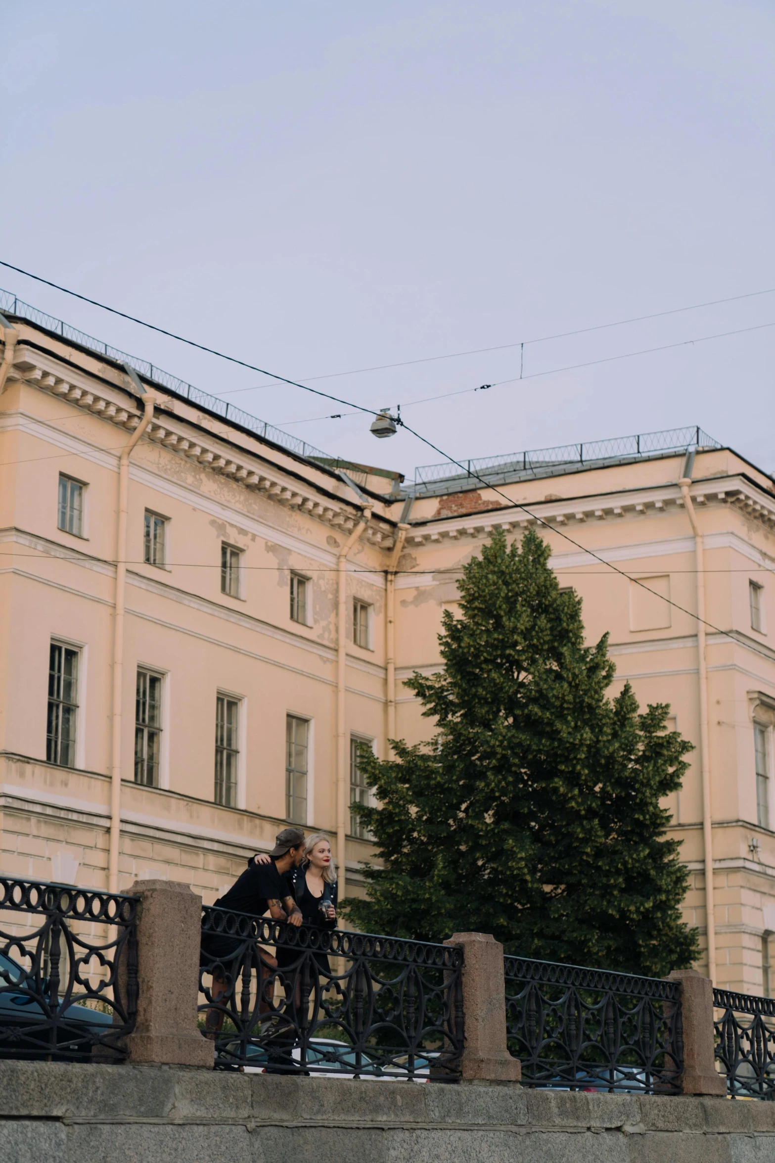 two people with bicycles taking a break from biking